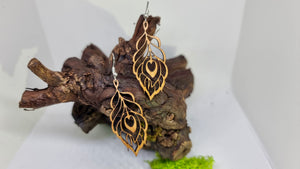 Handmade Wooden Dangling Earrings in the shape of a Peacock Feather