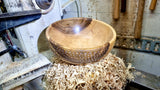 Handcrafted Walnut Bowl with Decorative Elements