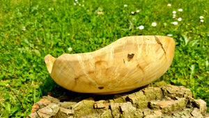 Handmade bowl with natural edge from linden burl